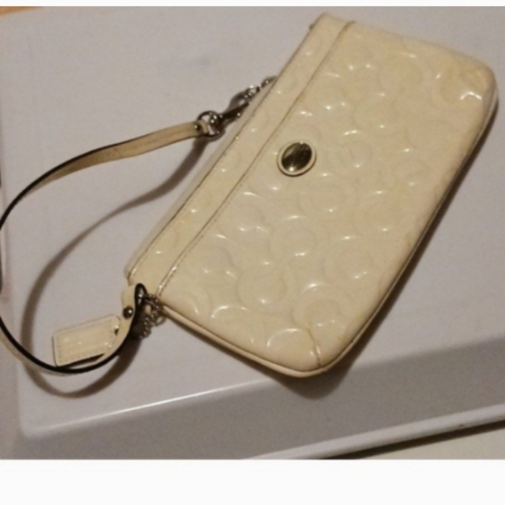 Coach Cream Embossed Wristlet